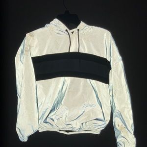 a reflective crop top jacket hood in the back